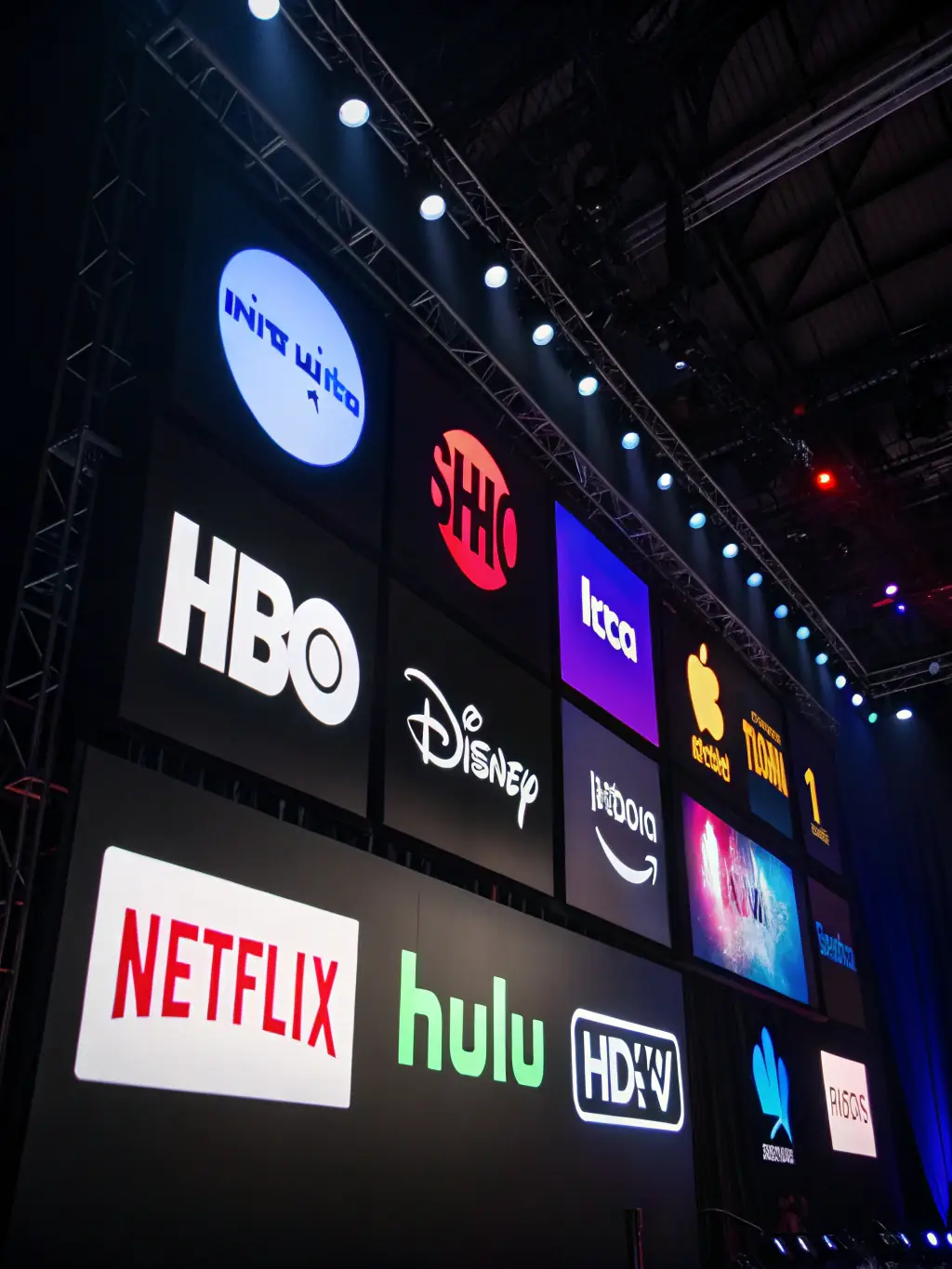 A visually appealing image of various streaming service logos (Netflix, Spotify, etc.) with an overlay of targeted ad placements, emphasizing the precision of OTT advertising.